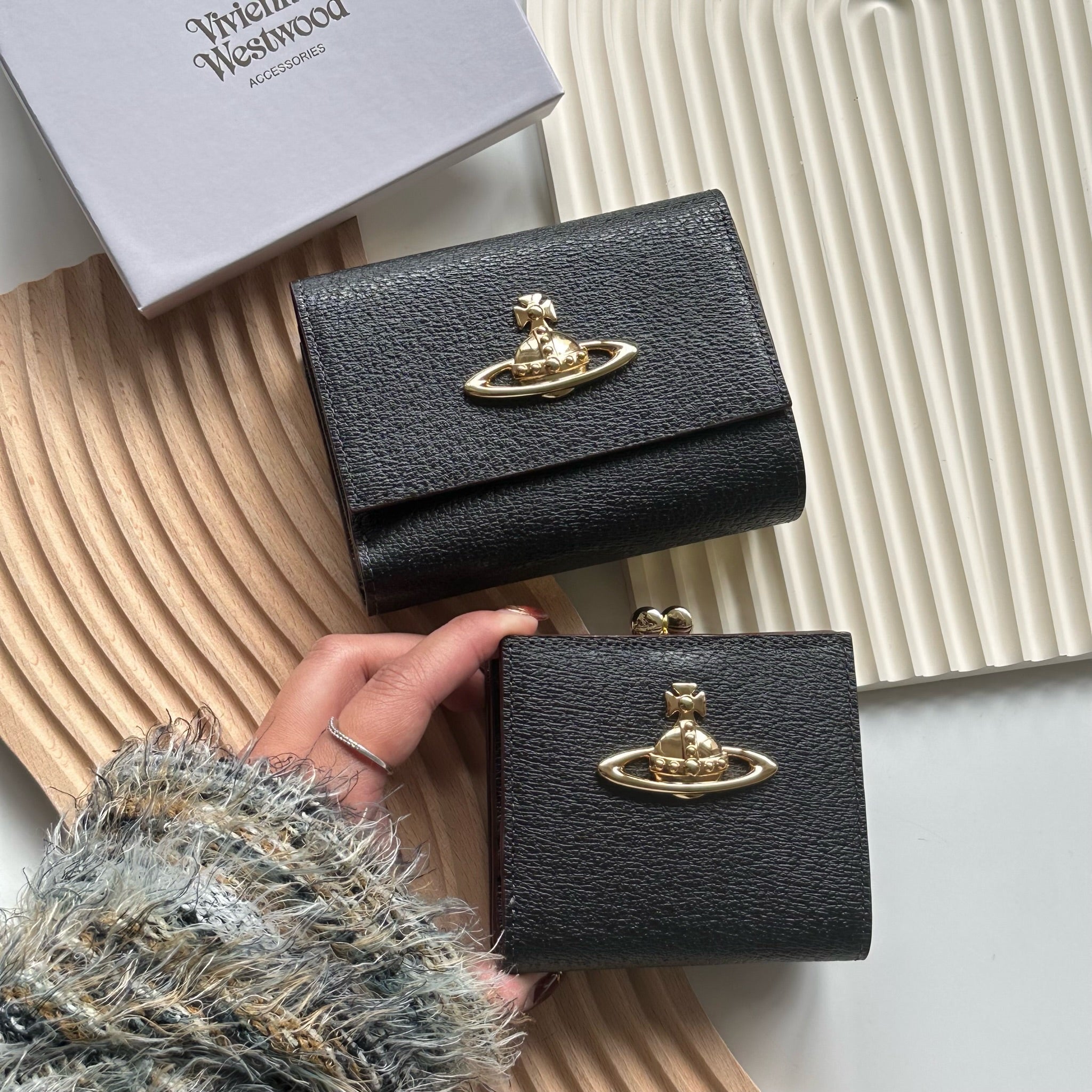Vivienne Westwood square small silver purse with a firm, pebbled
